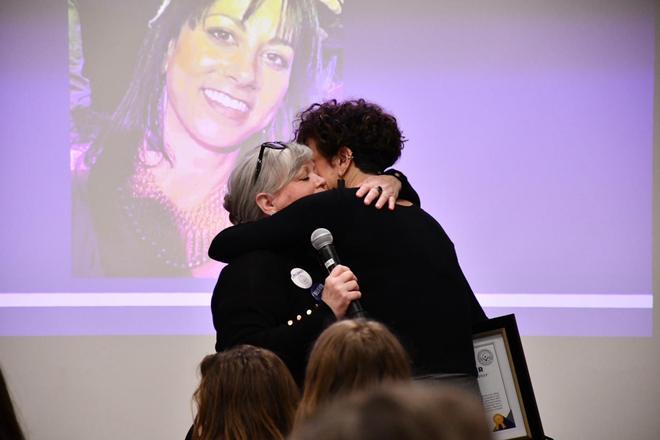 An emotional moment on stage at the award ceremony.