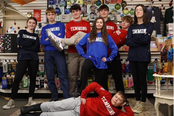 The CES youth team lined up in the store.